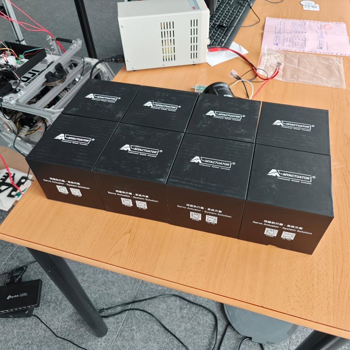 Boxes of MyActuator motors freshly arrived at the team's workshop